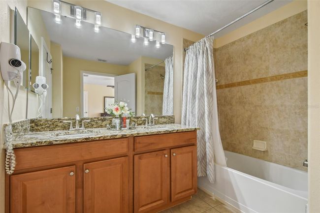 8963 Coco Palm Rd, Townhouse with 4 bedrooms, 3 bathrooms and null parking in KISSIMMEE FL | Image 14
