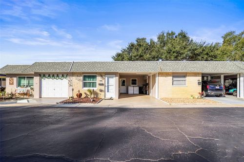 242 Sky Loch Dr E, DUNEDIN, FL, 34698-8138 | Card Image