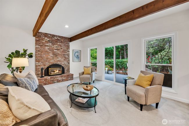 Brick fireplace with gas insert to provide added warmth on those chilly NW evenings | Image 15