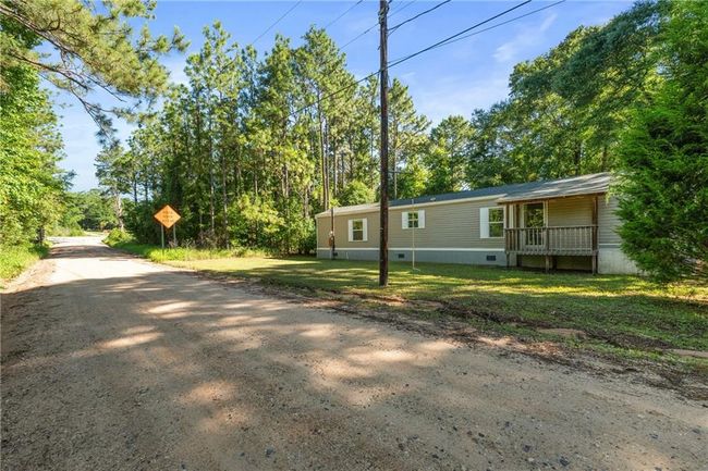 View of front of home with a front lawn and a porch | Image 4