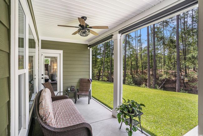 Sunroom featuring ceiling fan | Image 29