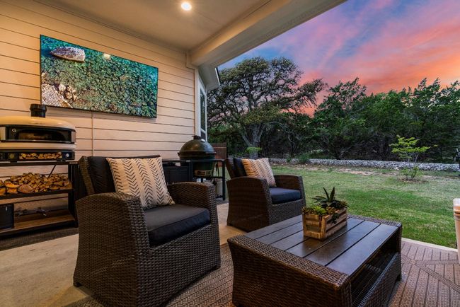 Wooden terrace with a lawn and a patio area | Image 34