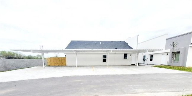 Rear view of house with fence | Image 22