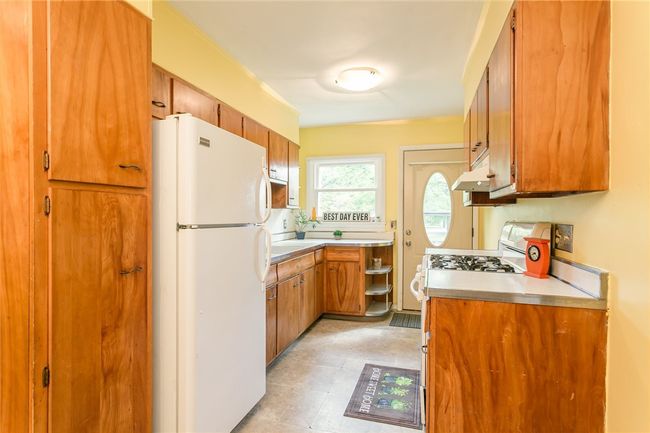 Inlaw Kitchen with door to patio | Image 14