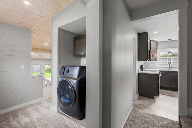 First floor laundry on the main level with an all in one washer-dryer! | Image 11
