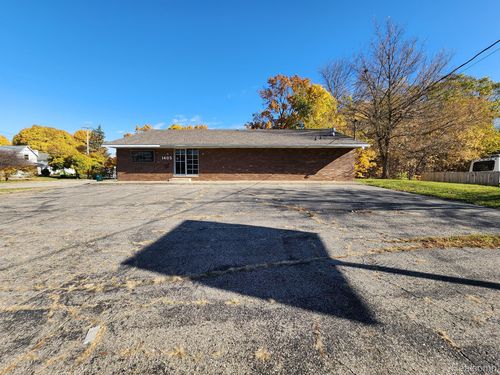 1405 E Cesar E Chavez Ave, Lansing, MI, 48906-5440 | Card Image