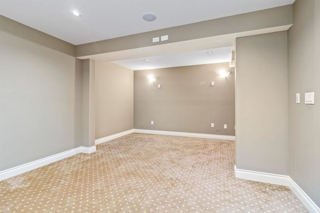 Finished below grade area featuring carpet floors, baseboards, and recessed lighting | Image 8
