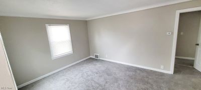 View of carpeted empty room | Image 3