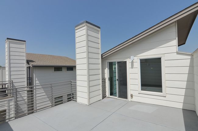 Rooftop patio; use the spiral stairs to access this | Image 13