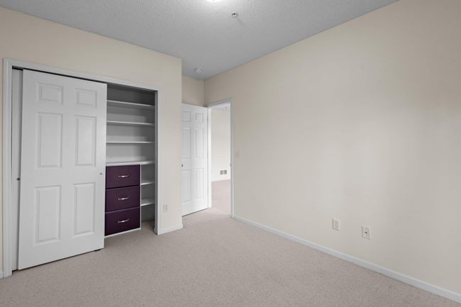 A custom closet insert in the lower bedroom closet. | Image 41