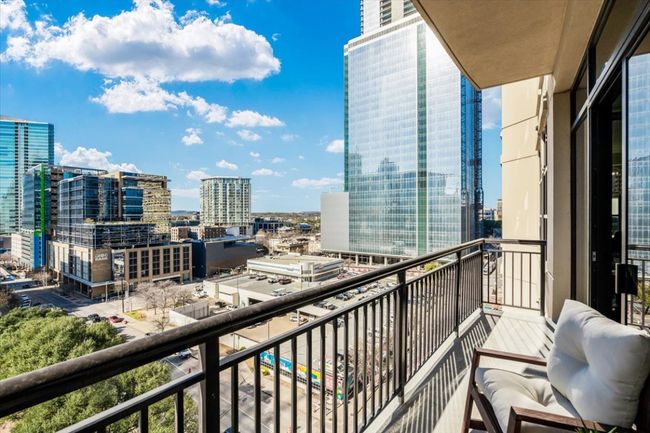 Balcony with a view of city | Image 35
