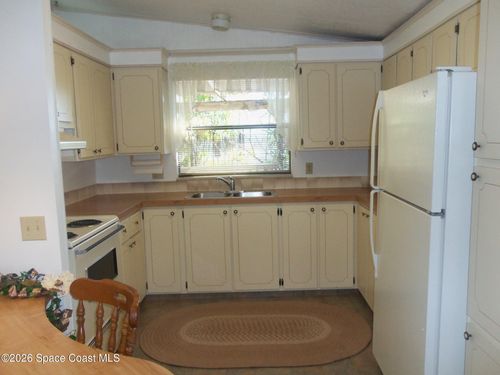 559 Marlin Cir, Barefoot Bay, FL, 32976-2403 | Card Image