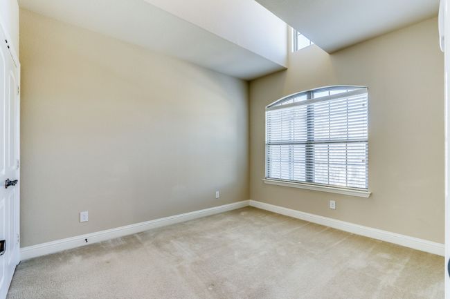 Spare room featuring light colored carpet and baseboards | Image 25