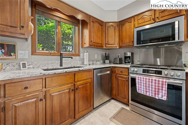 Gas range in the kitchen. All appliances have been replaced and upgraded | Image 11