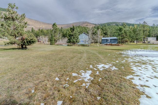 View of yard with a mountain view | Image 73