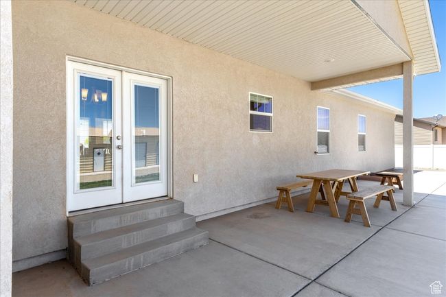 View of patio / terrace with entry steps and outdoor dining area | Image 53