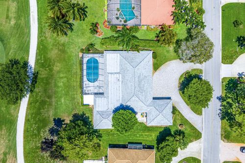 489 S Country Club Dr, Atlantis, FL, 33462-1239 | Card Image