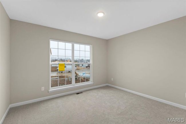 Unfurnished room featuring carpet flooring and baseboards | Image 4
