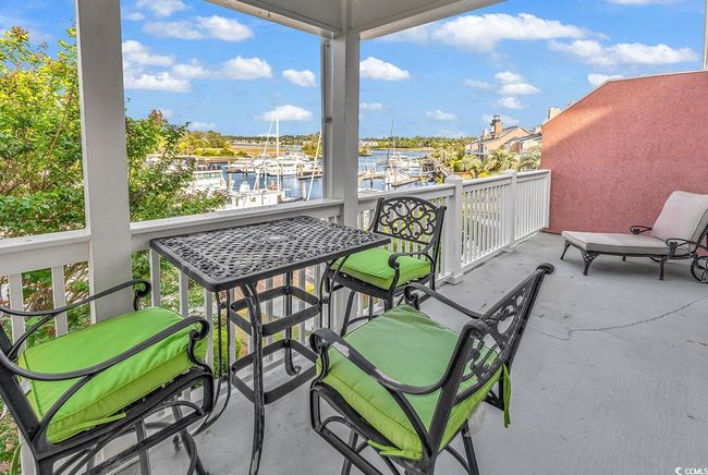 Balcony featuring a water view | Image 31
