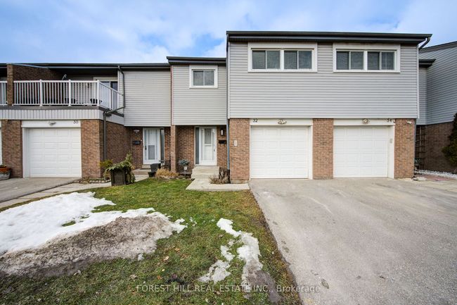 32 - 500 Osgoode Dr, Condo with 4 bedrooms, 2 bathrooms and 2 parking in London ON | Image 1