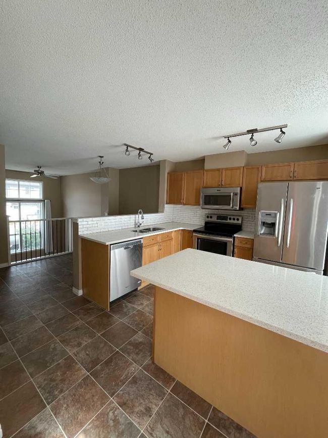 3026 New Brighton Gardens Se, Home with 2 bedrooms, 2 bathrooms and 2 parking in Calgary AB | Image 5