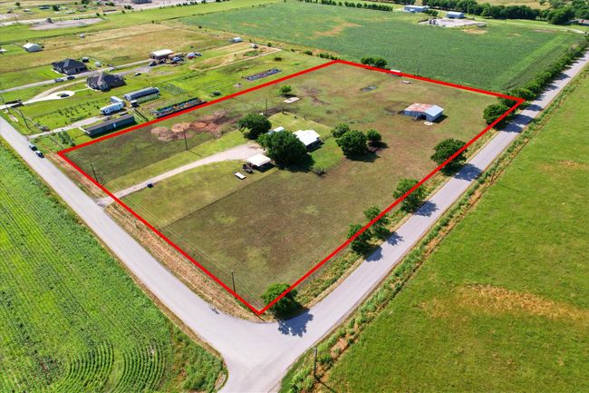 Aerial view of sparsely populated area with property boundaries highlighted | Image 5