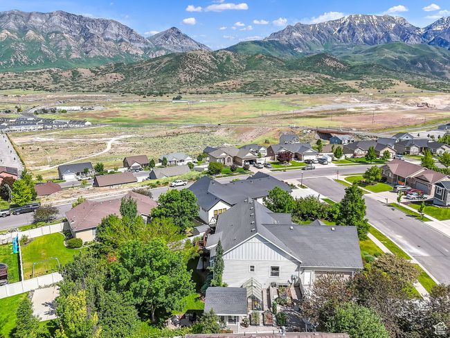 Aerial view of residential area featuring a mountain backdrop | Image 61