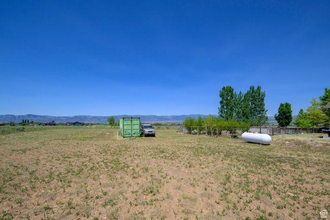 View of yard featuring a mountain view and a view of rural / pastoral area | Image 41
