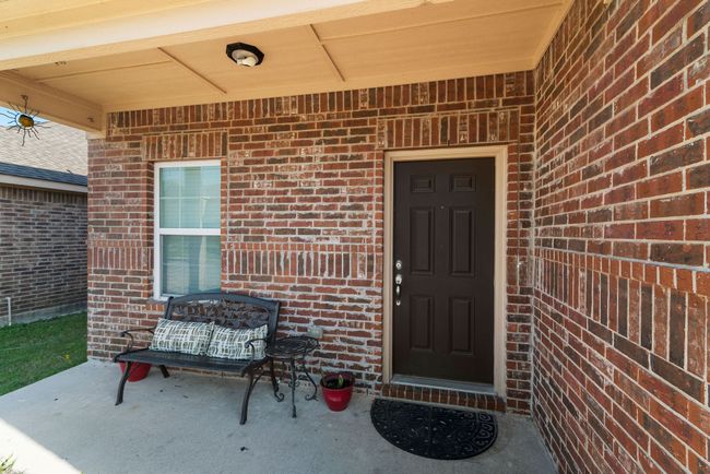 Property entrance featuring brick siding | Image 7
