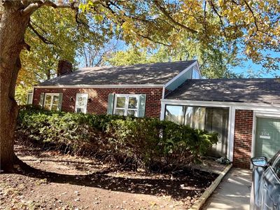 View of home's exterior featuring a garage | Image 3