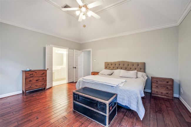 Primary bedroom located on the first floor. | Image 16