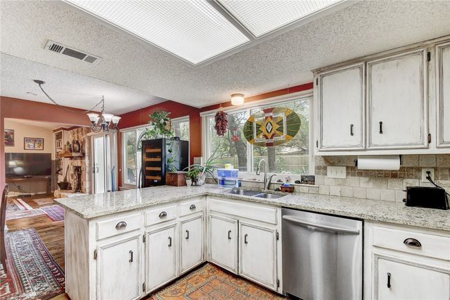9001 Bubbling Springs Trl, House other with 4 bedrooms, 2 bathrooms and 4 parking in Austin TX | Image 8