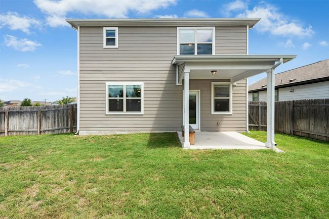 Back of property with a patio area and a fenced backyard | Image 40