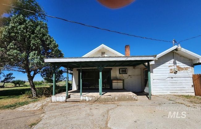 Back of house featuring a chimney | Image 14