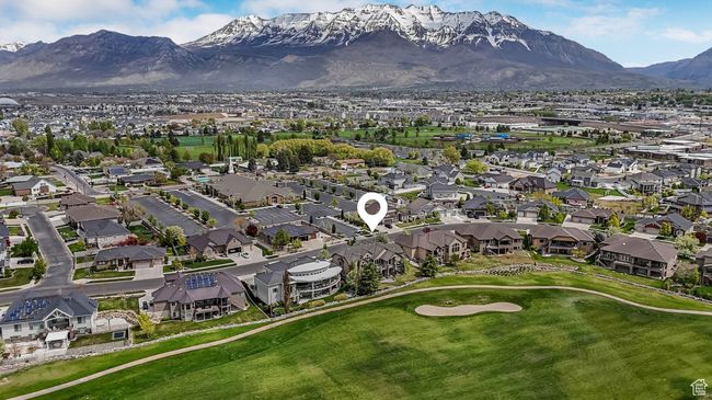 East facing Aerial view featuring a residential view, view of golf course, and a mountain view | Image 33