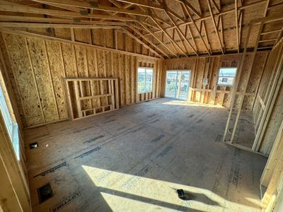 Miscellaneous room featuring lofted ceiling | Image 2