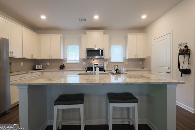 2798 Morgan Spring Trl, House other with 5 bedrooms, 3 bathrooms and null parking in Buford GA | Image 8