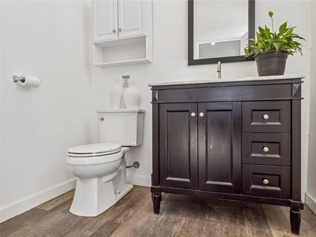 Powder room off of office kitchen area with radiant floor heat | Image 5