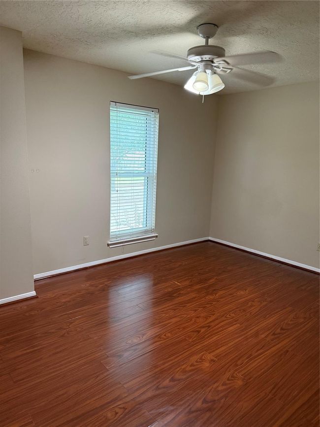 Lovely breakfast room with a good view of the back yard. | Image 34