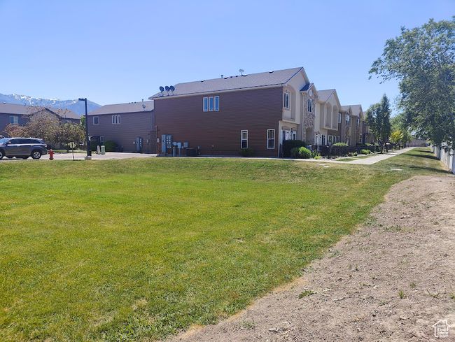 Back of property with a residential view and a yard | Image 29