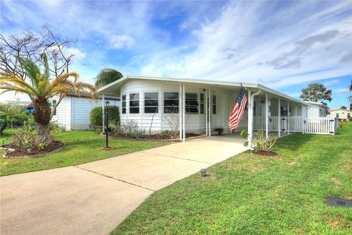 902 Periwinkle Cir, Barefoot Bay, FL, 32976-7679 | Card Image