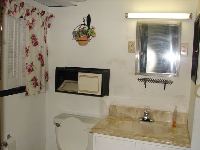 Basement bathroom has a shower | Image 24