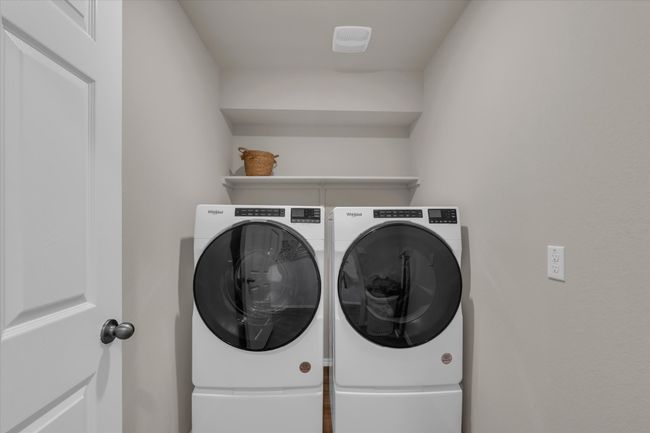 Clothes washing area with separate washer and dryer | Image 25