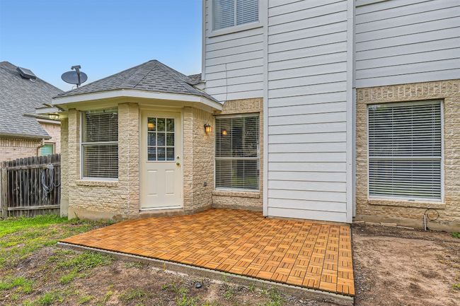 Entrance to property with fence and a patio area | Image 20