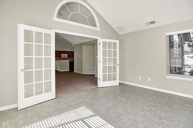 Sun Room French Doors leading into Great Room. | Image 9