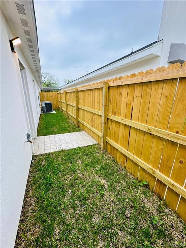 View of yard featuring central air condition unit | Image 11