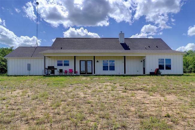 Back of property featuring a lawn | Image 36