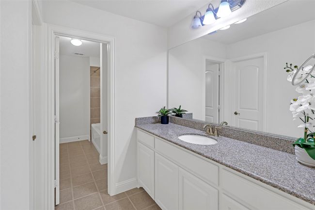 Full bath with tile patterned floors and vanity | Image 34