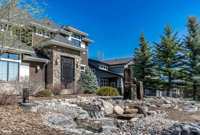 160 Heritage Isle, Home with 4 bedrooms, 3 bathrooms and 9 parking in Heritage Pointe AB | Image 2