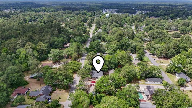 Aerial overview of property's location with a forest | Image 38